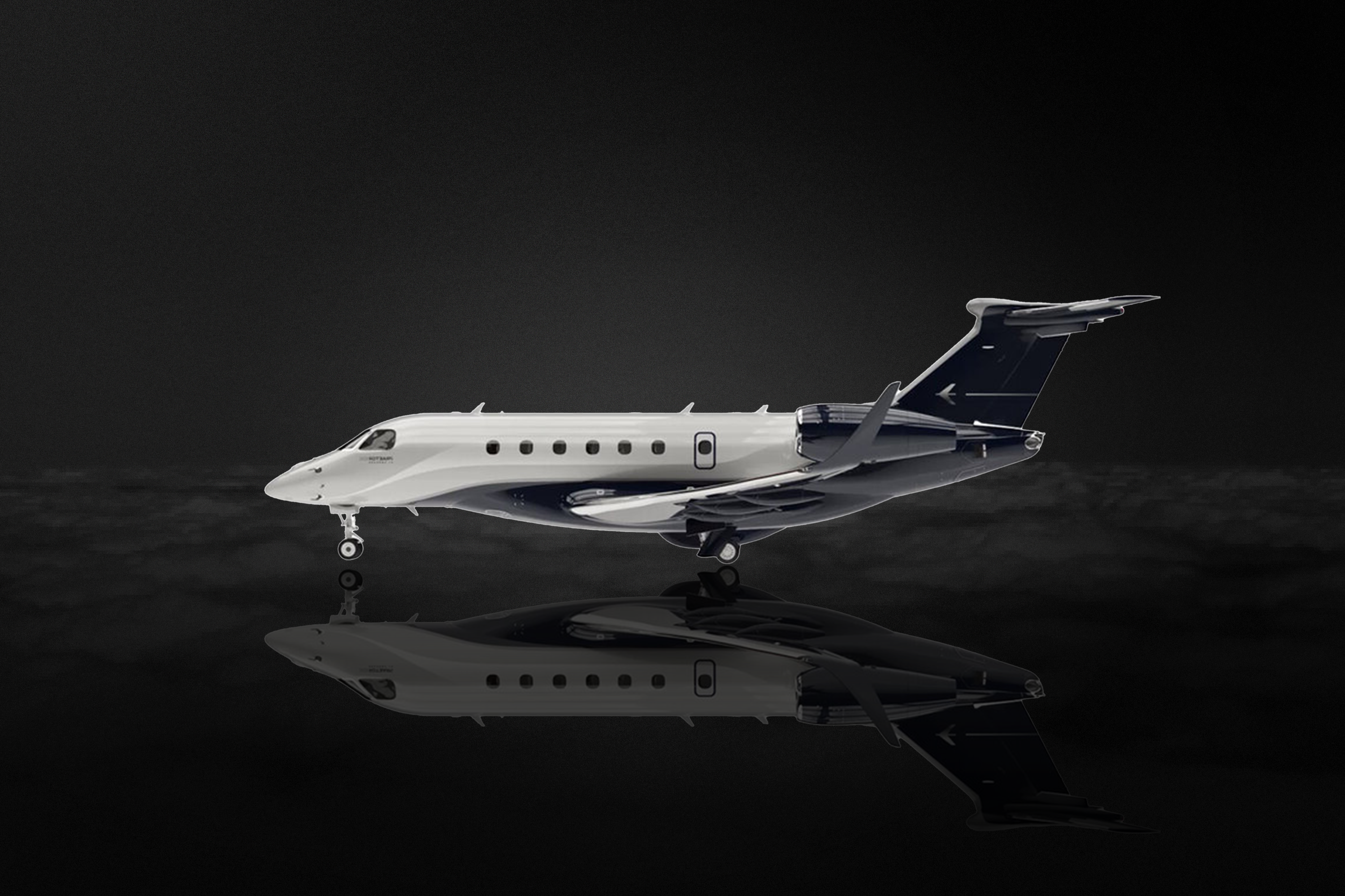 A white and dark blue business jet is shown in profile with a reflection on a dark surface.
